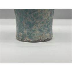 Holyrood Pottery vase of bulbous form decorated in a mottled and streaked green and blue glaze, with printed mark beneath, H24cm