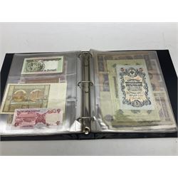 World banknotes, including Queen Elizabeth II The States of Jersey one pound 'DB202703', five pounds 'BB527762' and ten pounds 'AB651481', reserve bank of New Zealand two dollars '1L3 741894', King George V Straits Settlements one dollar 1st January 1935 'F/83 28924', various Bank of England notes etc, housed in two ring binder albums