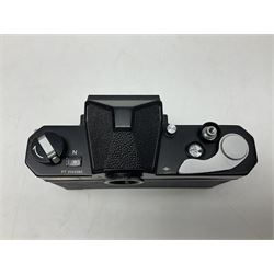 Nikkormat FT2 camera body, serial no. 5066813, in original packaging, together with Nikkormat EL camera body, serial no. 5577358, with Nikon Nikkor 50mm 1:1.8' lens no. 2143575, Nikkormat FT, serial no. 3968385, and Nikomat FT camera body, serial no. 4015491