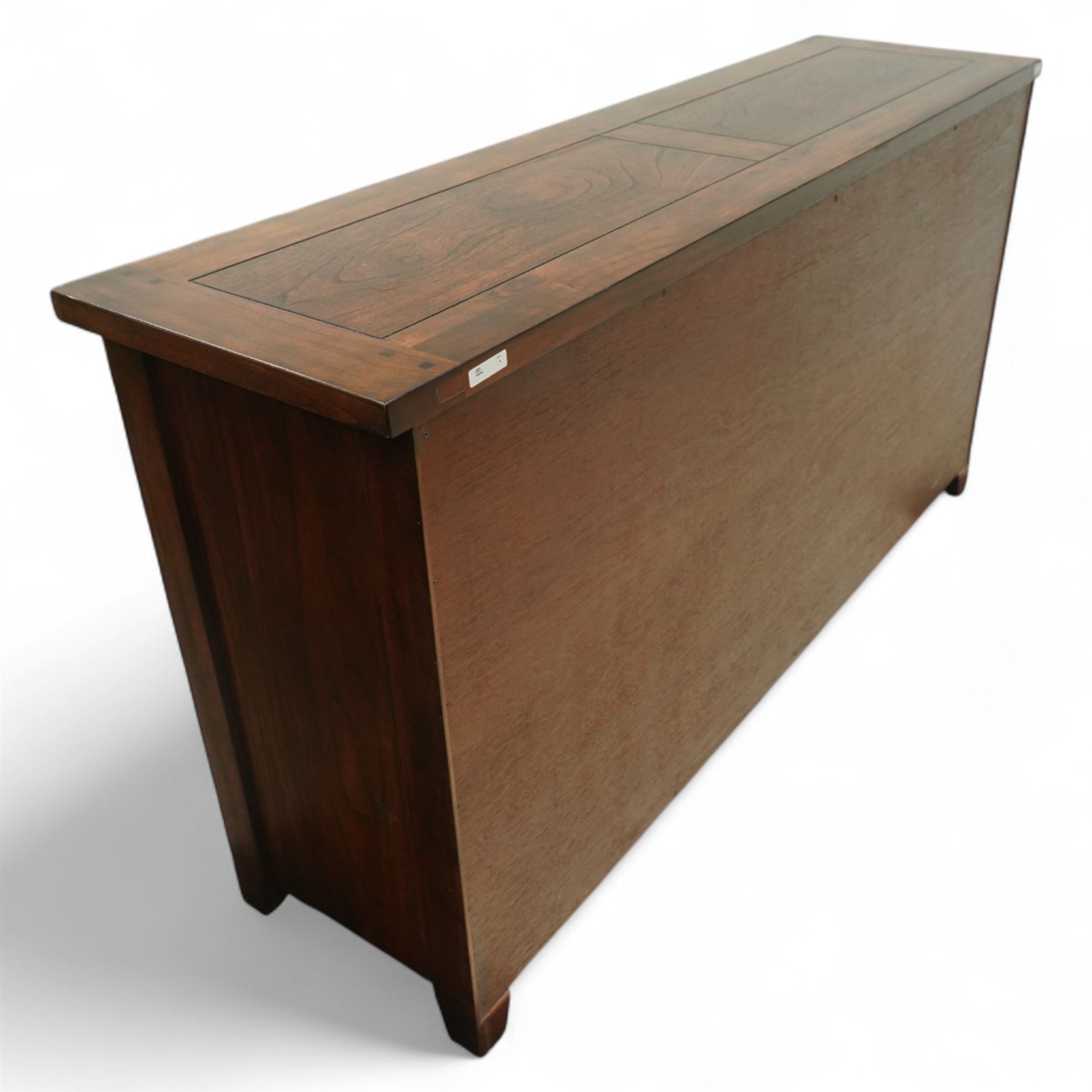 Contemporary hardwood sideboard, rectangular plain top above three short drawers and four central drawers flanked by two panelled cupboard doors 