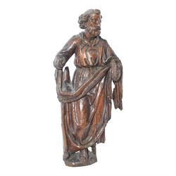 17th century well carved limewood figure of a saint, possibly John the Baptist, H47cm