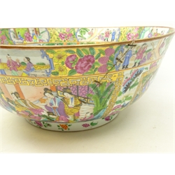  Large 19th century Cantonese Famille Rose punch bowl, the exterior painted with panels of courtiers and figures in gardens and interiors surrounded by greek key gilded borders, the interior similarly painted with a continuous scene with a central circular panel with an figures and attendants, D42cm (a/f)  