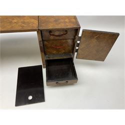 Japanese miniature kneehole desk decorated with parquetry inlay, the loose leaf top resting on one pedestal cabinet with four drawers, and another with hinged cupboard door opening to reveal two interior drawers above a lower drawer, H26cm, W68.5cm D24cm