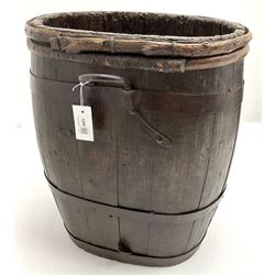 19th century coopered barrel, oak and metal bound, fitted with rear wrought metal loop