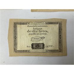 Five French Revolutionary period assignat notes (notes of this type were issued between 1789 and 1796), each mounted on paper