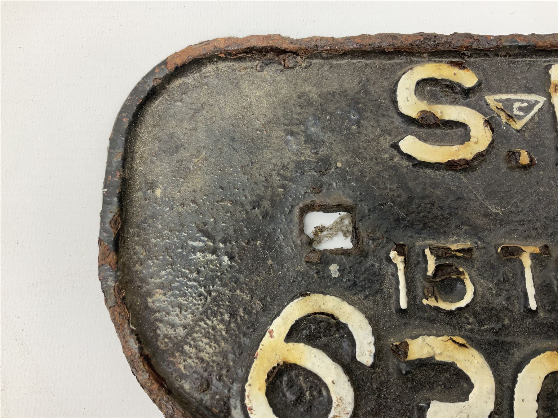Three cast iron railway wagon plates of D shaped form to include Southern Railway, LMS and GWR, L27.5cm