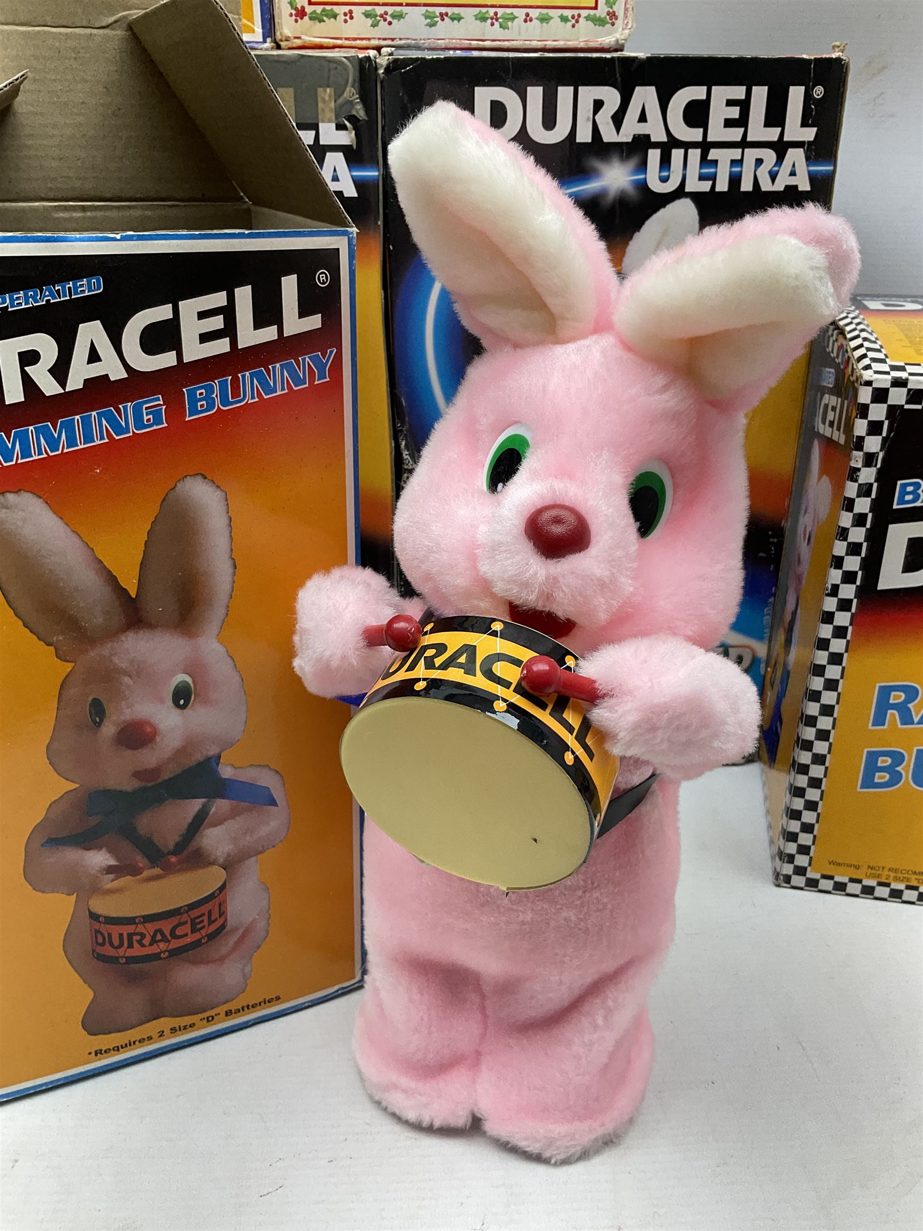 Collection of battery operated Duracell Bunny advertising figures, comprising two limited edition France 98 World Cup football bunnies, racing bunny, football bunny, two globetrotter bunny, fireman bunny and Christmas bunny, all boxed