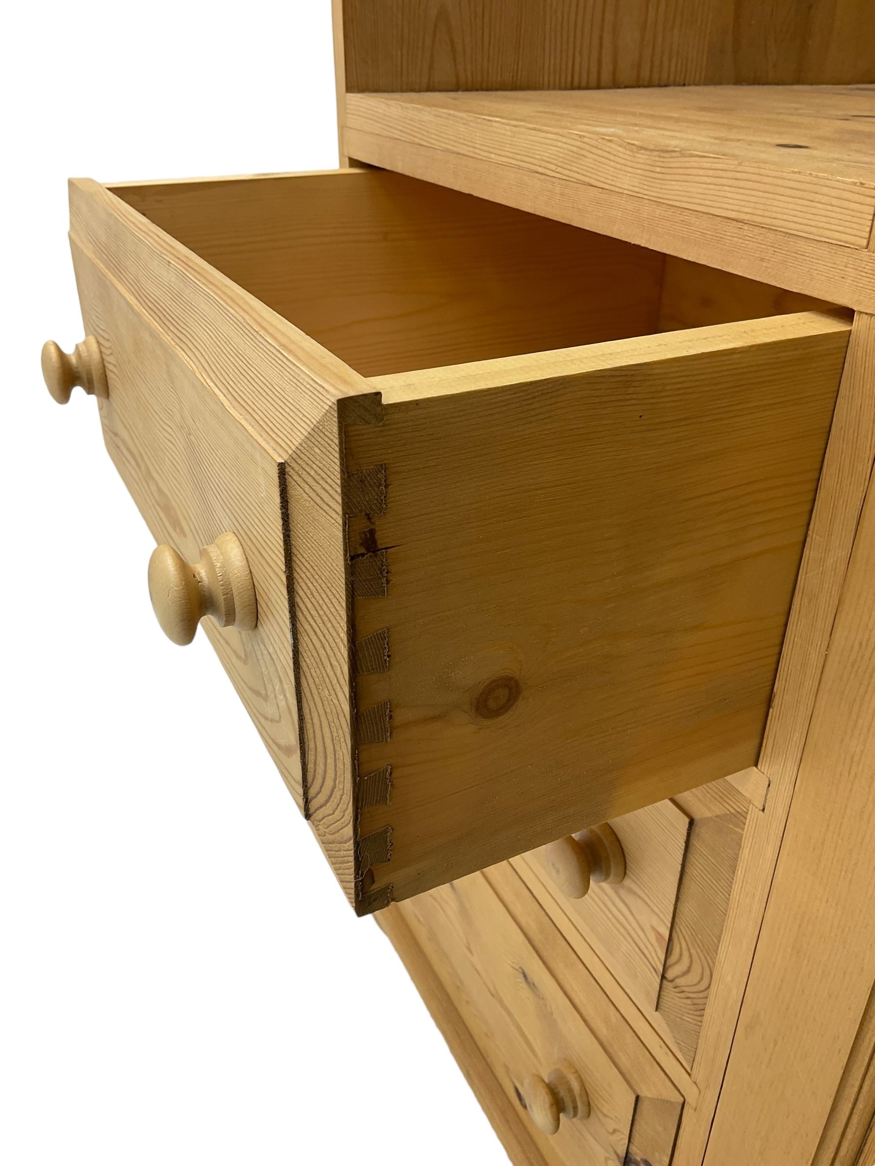 Traditional pine combination wardrobe, recessed cupboard with mirror back, fitted with single cupboard and three drawers