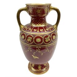 1886 Royal Crown Derby twin handled urn, decorated with gilt swags, fruit and insects on a red ground, H19cm 