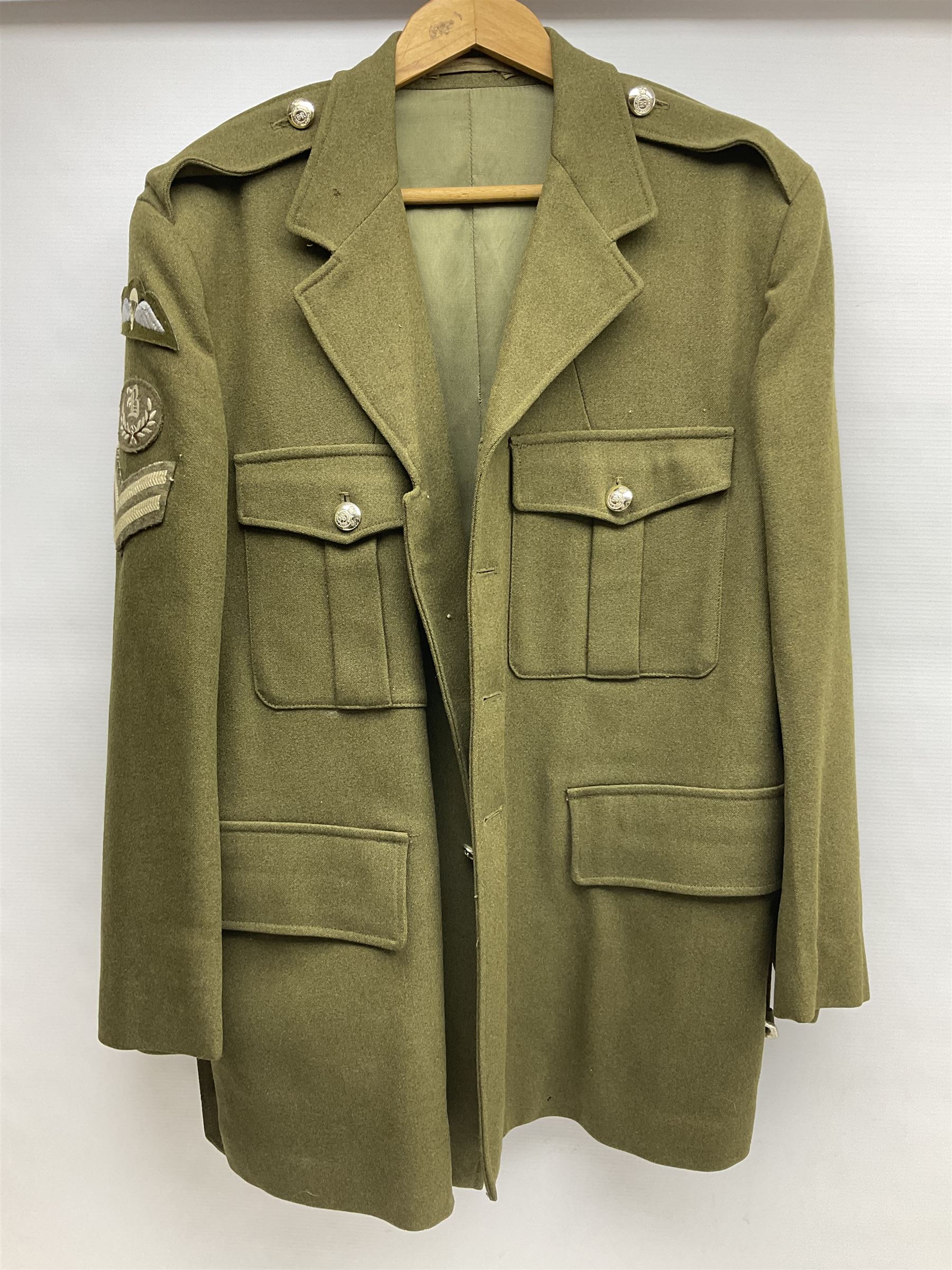 Five military uniforms comprising German Wachbataillon tunic, RASC No.2 dress tunic dated 1963, RAF tunic and trousers dated 1974, RE No.1 tunic and RN Seamans jumper Class II (5)
