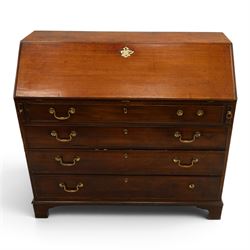 George III mahogany bureau of large proportions, the fall-front enclosing fitted interior ...