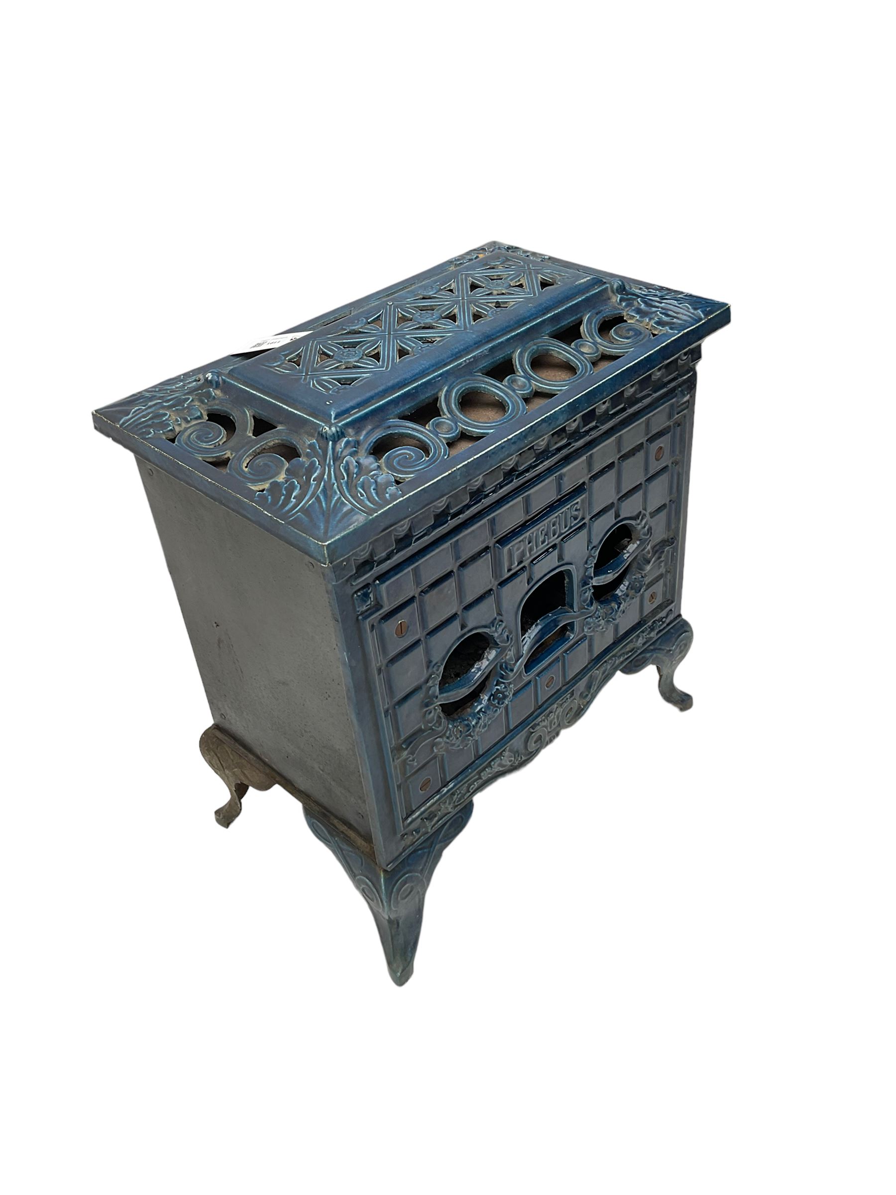 Poeles Nanquette - Art Deco 'Phebus' French enamel wood burning stove, indigo colour with pierced scrollwork decoration and acanthus leaves, on cabriole supports
