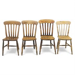 Eight Victorian farmhouse chairs in elm and beech, spindle-back frames with moulded seats, on turned and plain supports