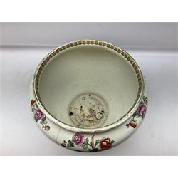 Large ceramic Jardiniere on stand, decorated with an oriental pheasant perched upon branches blossoming with peonies and foliage on white ground, overall H99cm
