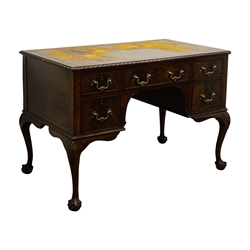  George lll style mahogany kneehole writing desk, gadroon carved top with inset brown leather writing surface, the five cockbeaded drawers with brass swan necked handles on shell carved cabriole legs with claw and ball feet, W106cm, D62cm, H76cm   