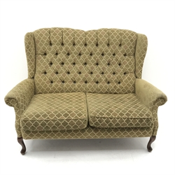 Traditional style two seat sofa, high shaped back upholstered in deep buttoned patterned fabric, cabriole feet, W146cm