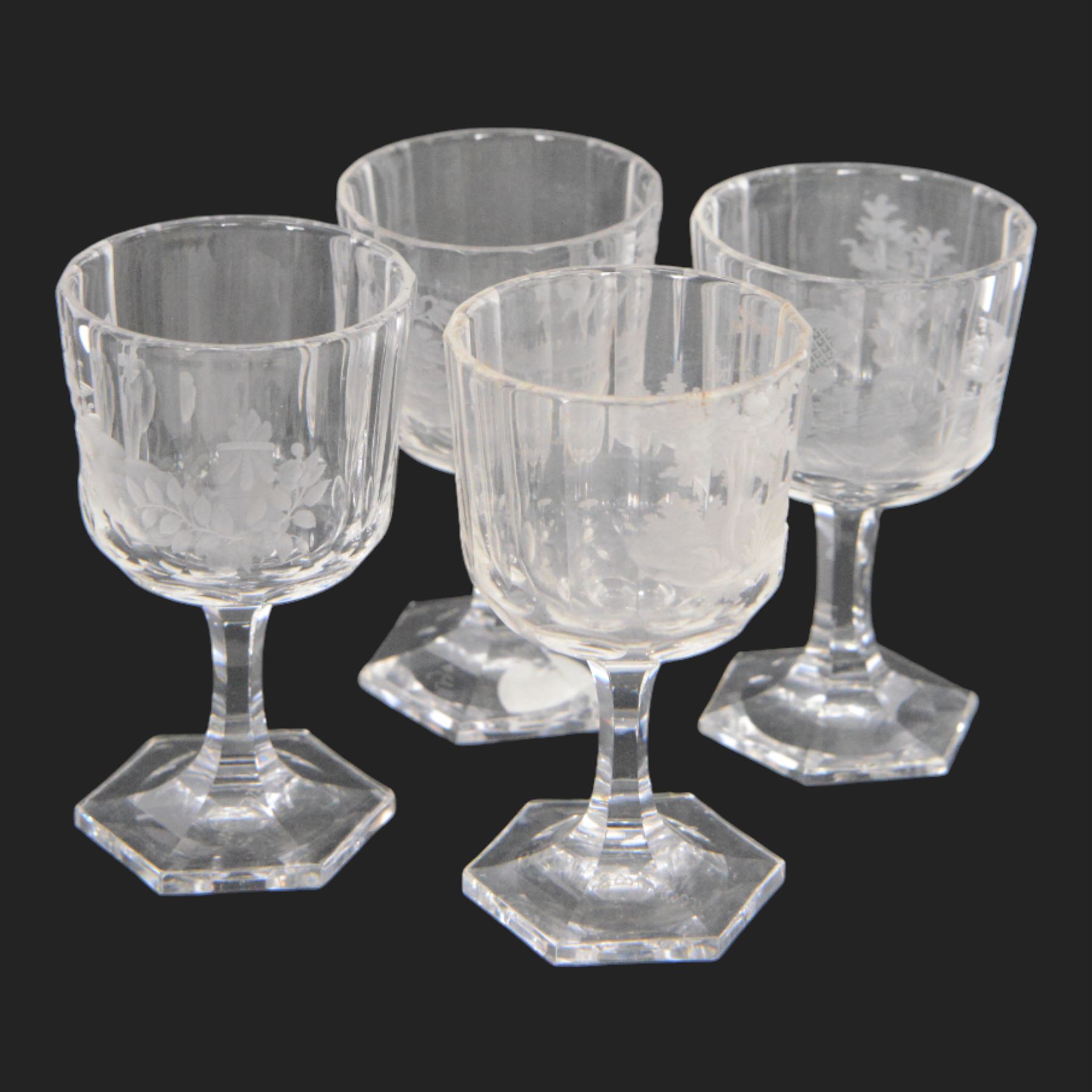 Set of four Galle, Nancy, intaglio engraved liqueur glasses, Gallé, Nancy, circa 1880, each with faceted bucket bowl engraved with animals within landscape settings, upon hexagonal stems and hexagonal feet, two examples engraved 'Galle Reinemer a Nancy', one engraved 'Galle a Nancy', and one unsigned, H7cm