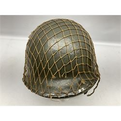 WW2 American MKI steel helmet with liner; green painted with camo net