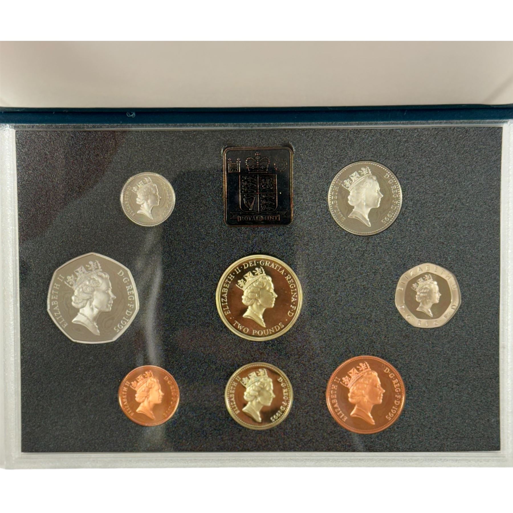 Eight The Royal Mint United Kingdom proof coin collections, dated 1987, 1988, two 1990, 1994, 1995, 2006 and 2007, all cased with certificates