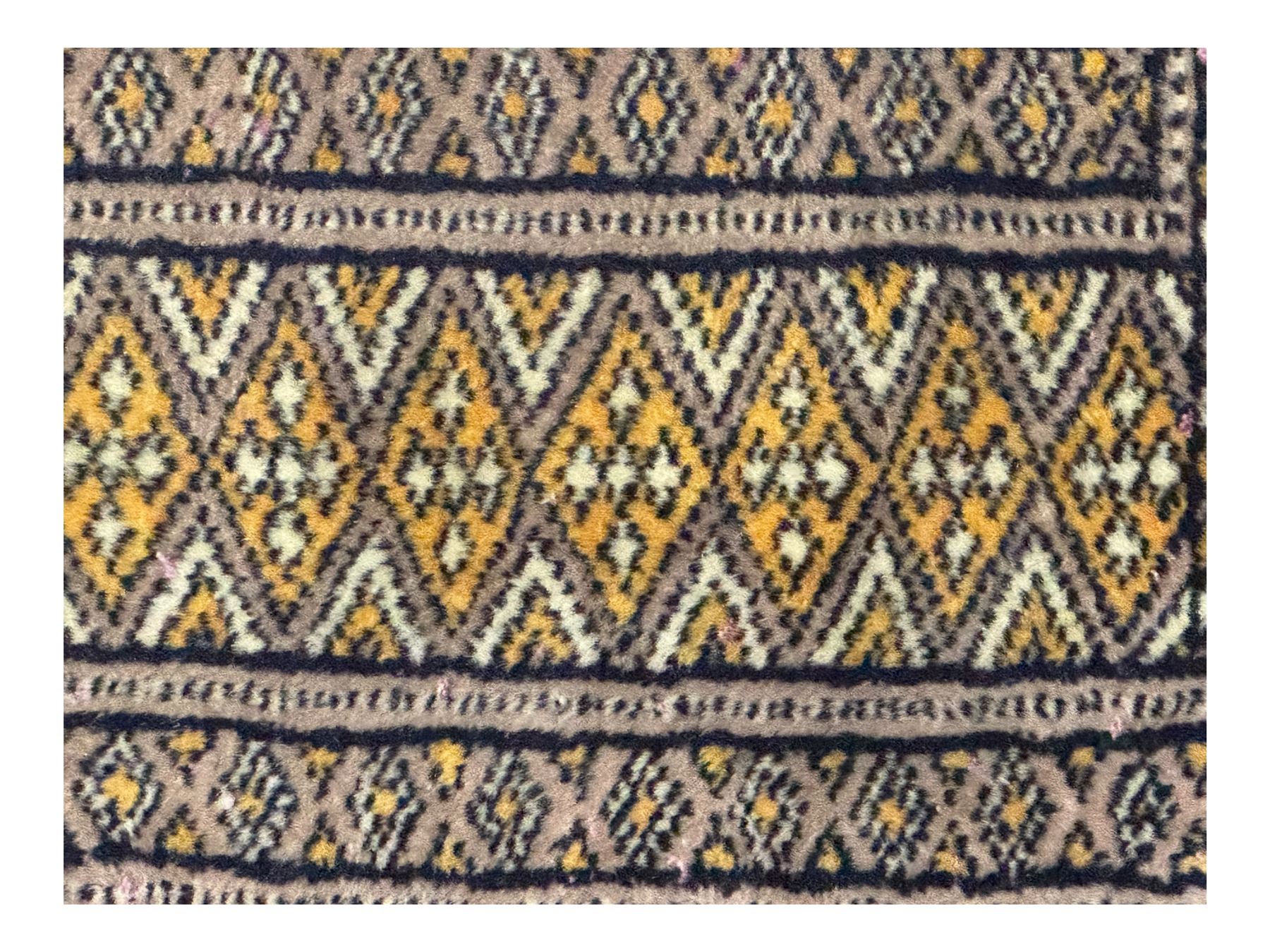 Pakistani Kashan hand-knotted rug with a central medallion and intricate geometric floral patterns, set against a red field and framed by a multi-band border (156 x 94cm); Pakistani Kashan rug with a repeating floral motif across the red field, enclosed by a detailed geometric border in complementary tones (162 x 95cm)
