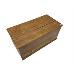 18th century oak mule chest, the hinged lid with applied moulding, plain front fitted with single long drawer, pressed brass escutcheons 