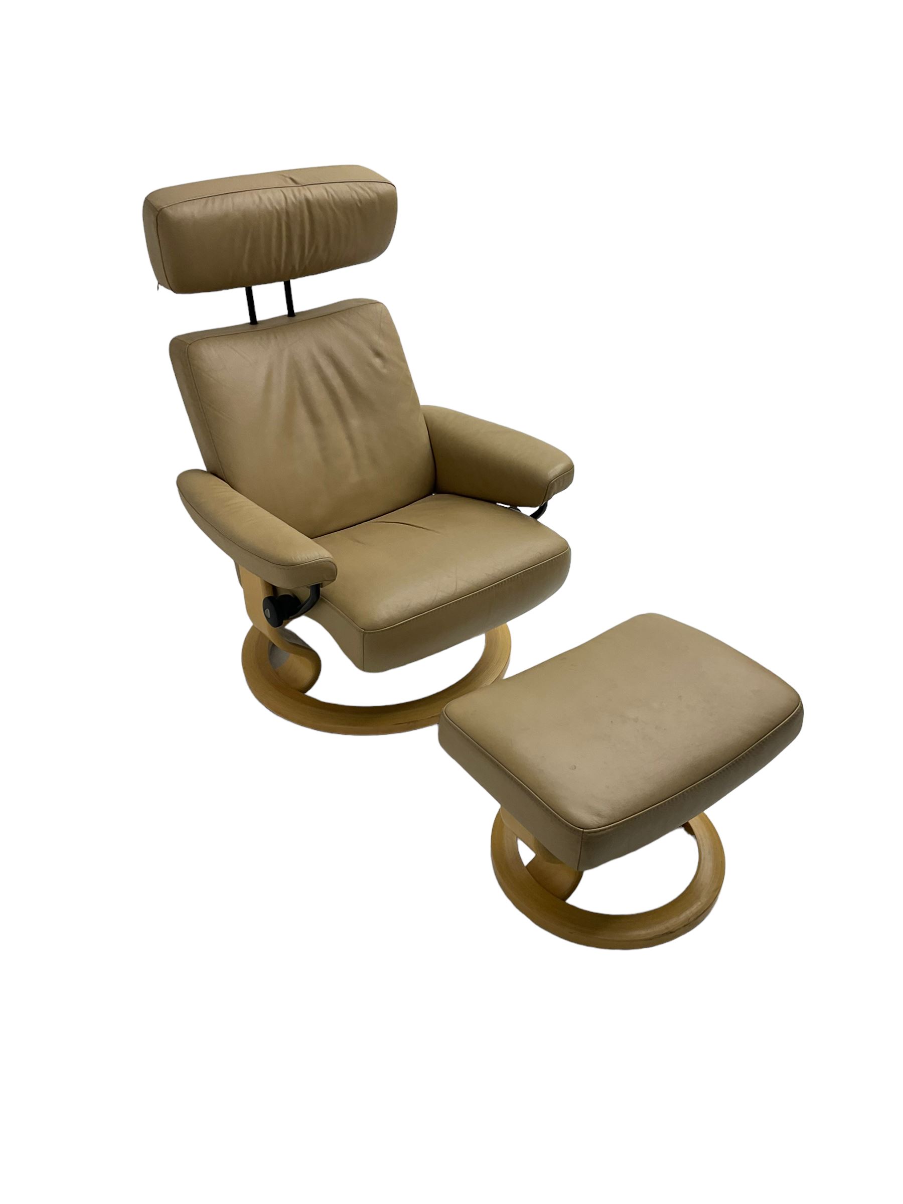 Ekornes Stressless - reclining armchair upholstered in latte leather, with footstool