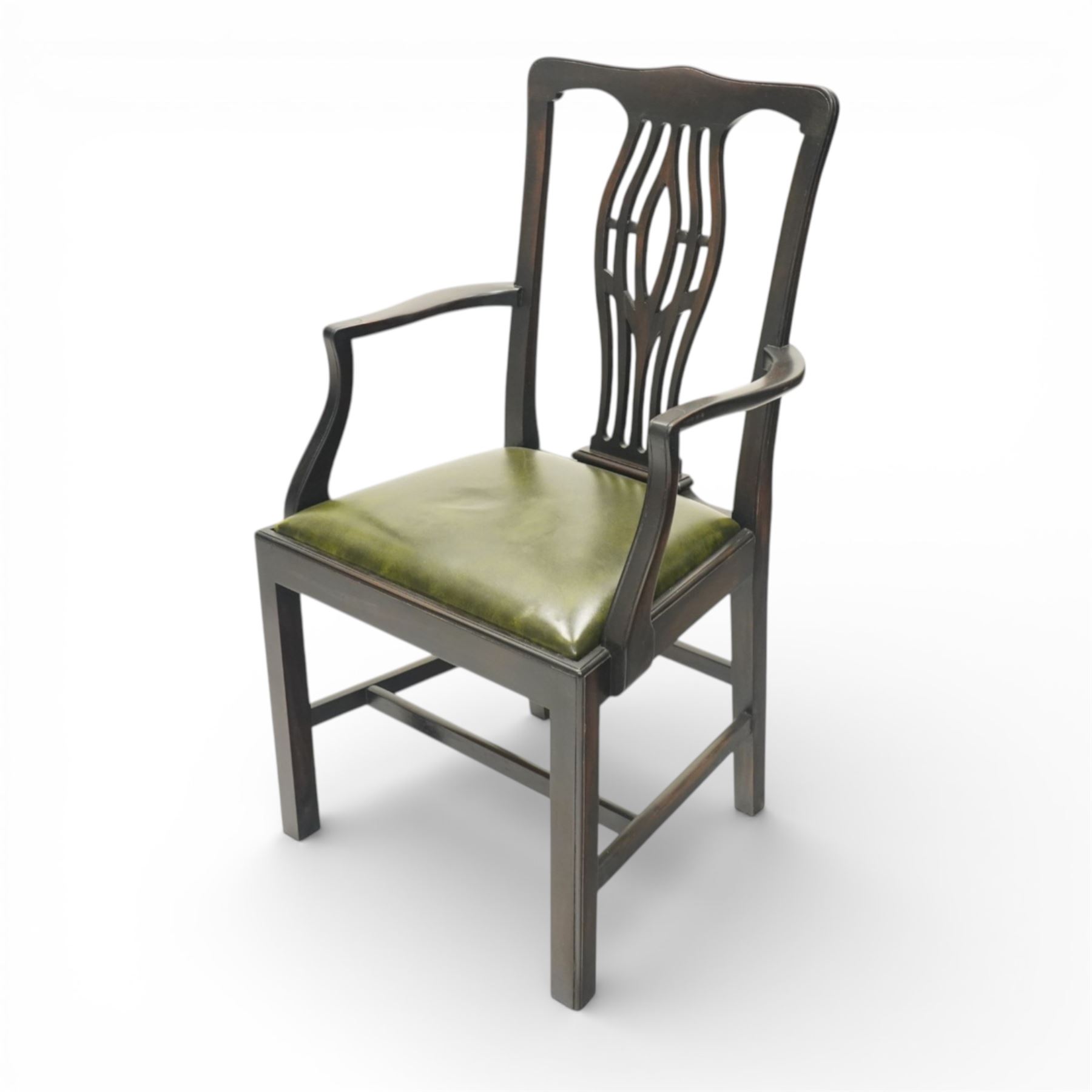 Set of eight Georgian style mahogany dining chairs, comprising six chairs and two carvers, the shaped top rails above pierced vase splats, and green leather upholstered drop in seats, upon square legs united by stretchers