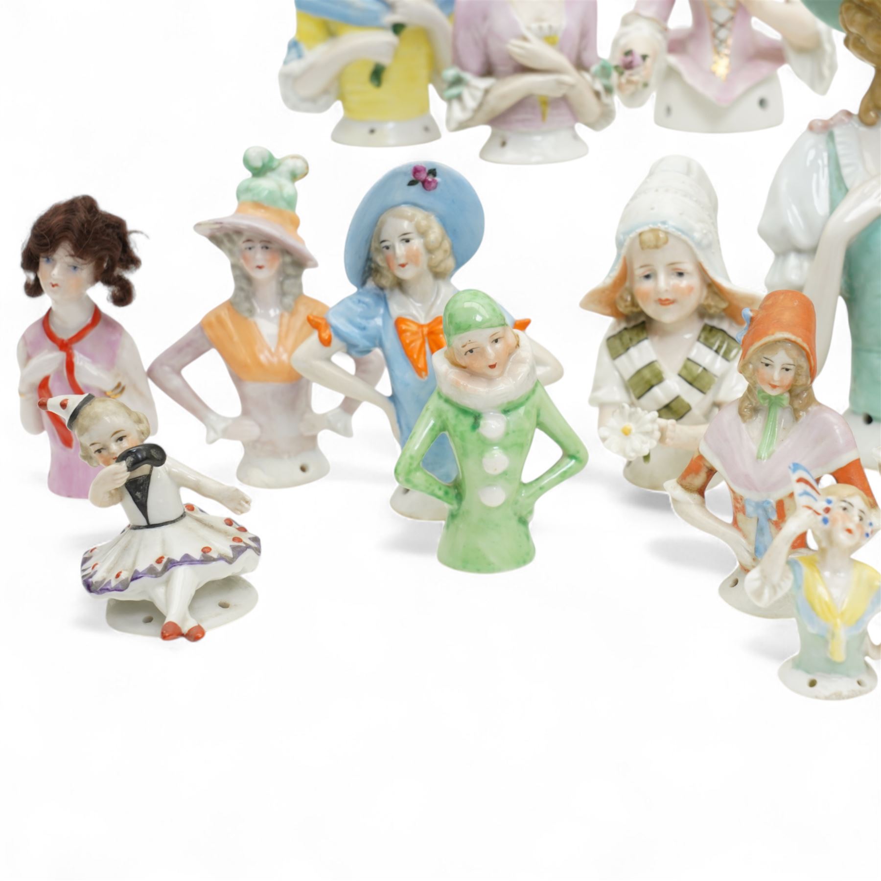 Collection of early 20th century ceramic half dolls, approximately 25