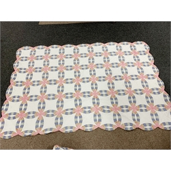 A Vintage style patchwork double quilt or bed spread, together with two single examples. 
