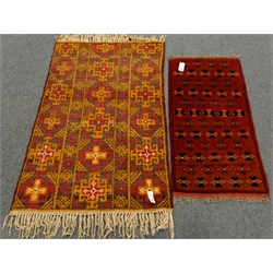  Persian style ochre ground rug, repeating border (195cm x 106cm), a red ground Turkish rug and two others  