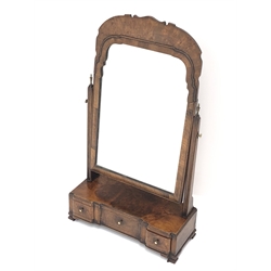  19th century Queen Anne style walnut toilet mirror, shaped plate with arched cresting on tapering supports with brass urn finials, the inverted breakfront base with three drawers on shaped bracket feet, H84cm, W47.5cm, D19cm  