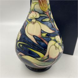 Moorcroft vase, of bottle form, decorated in the Orchid Arabesque pattern by Emma Bossons, circa 2002, H31.5cm, with original box 