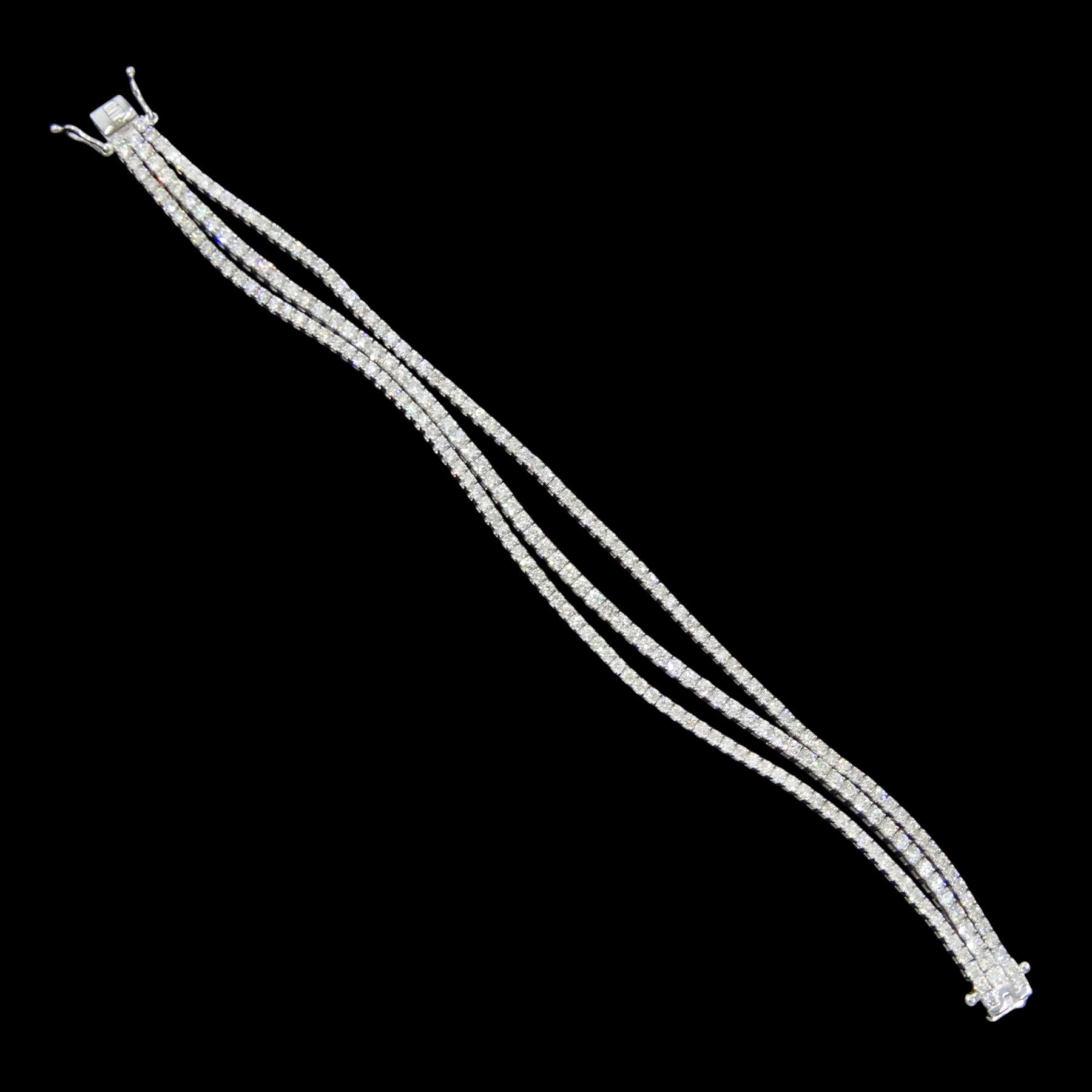 18ct white gold three row round brilliant cut diamond bracelet, stamped, total diamond weight approx 7.70 carat