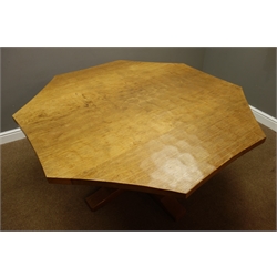  'Mouseman' adzed oak octagonal top dining table, on cruciform base, by Robert Thompson of Kilburn, H72cm, W136cm, D148cm (max)  