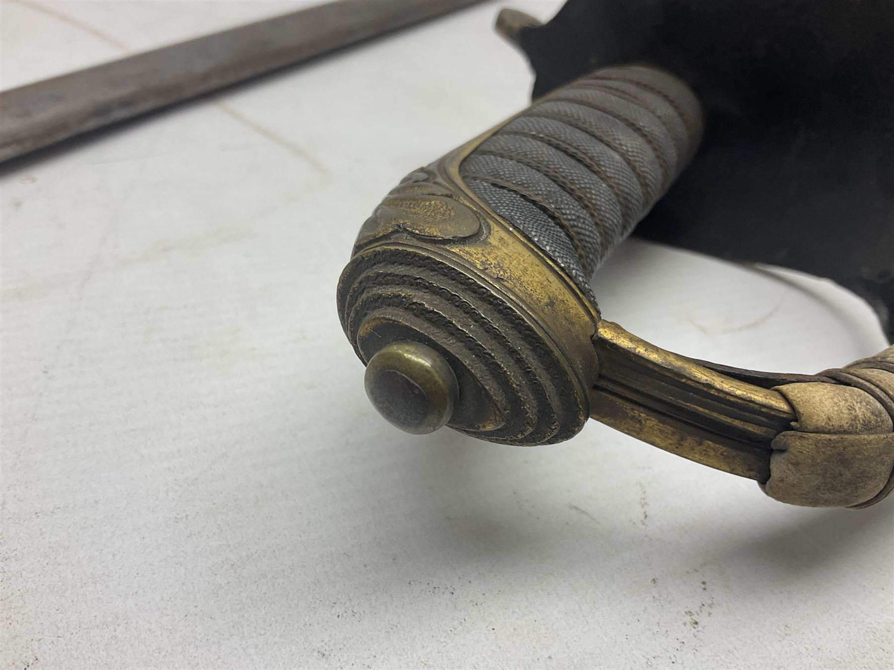 Victorian British Army officer's sword by Hobson & Sons Little Windmill Street London, the 82cm fullered steel blade etched with crowned Victoria cypher and 'HM 1st West York R.V.', lined gilded brass three-bar hilt incorporating Victoria cypher and wire-bound fish skin grip with plaited knot; in steel scabbard with two hanging rings L99cm overall