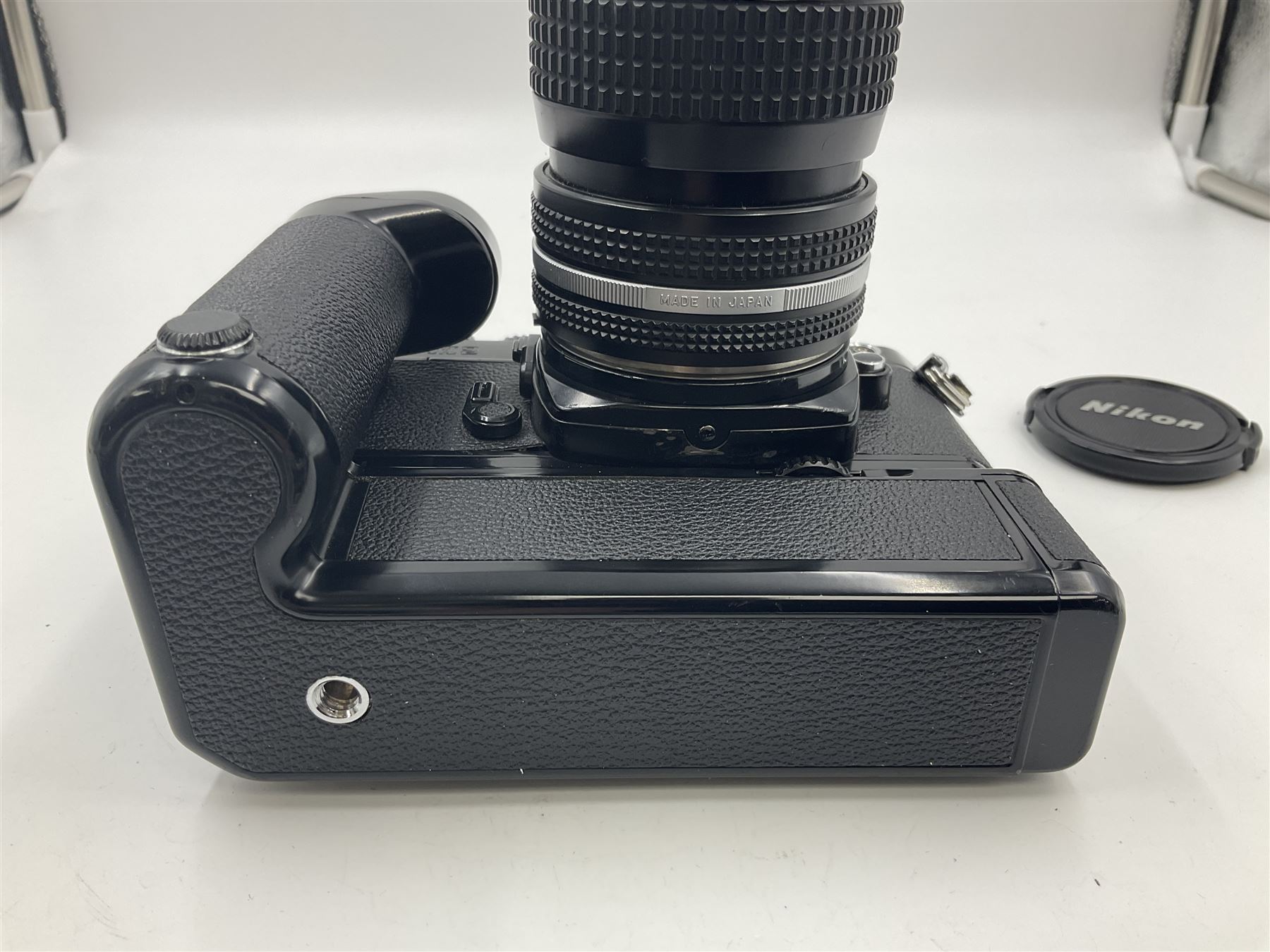 Nikon FM2n camera body, serial no. N8683100, with 'Nikon Zoom-NIKKOR 35-70mm 1:3.3-4.5' len, serial no. 2236565, Nikon MF-16 data back, serial no. 212905 and Nikon MD-12 Motor Drive, serial no 1570382 