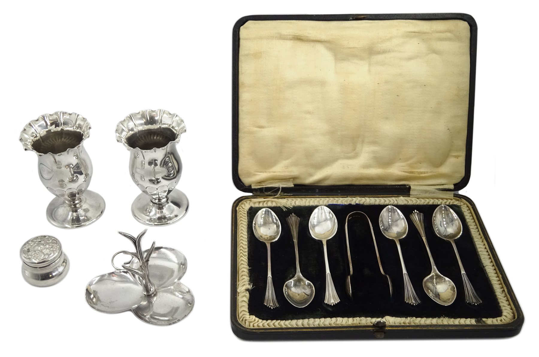 Two silver vases by Charles Edwards, London 1902, set of six teaspoons and sugar tongs by Lee & Wigfull, Sheffield 1918 cased, silver clover leaf bon bon dish by Henry Matthews, Birmingham 1903 and a hallmarked silver lidded box, weighable silver approx 6.9oz 
