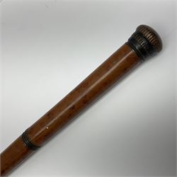 19th century malacca walking cane, the screw threaded domed cover opening to reveal vacant recess, above a further screw threaded opening revealing a removable glass vial with stopper, glass vial L41cm, cane L89.5cm