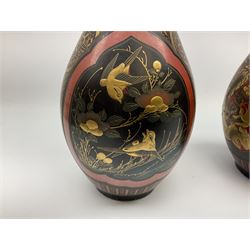 Pair of Japanese baluster form vases, with tapering necks and frilled rims, decorated with shaped panels of birds and blossoming flowers in gold, red and black, H30.5cm