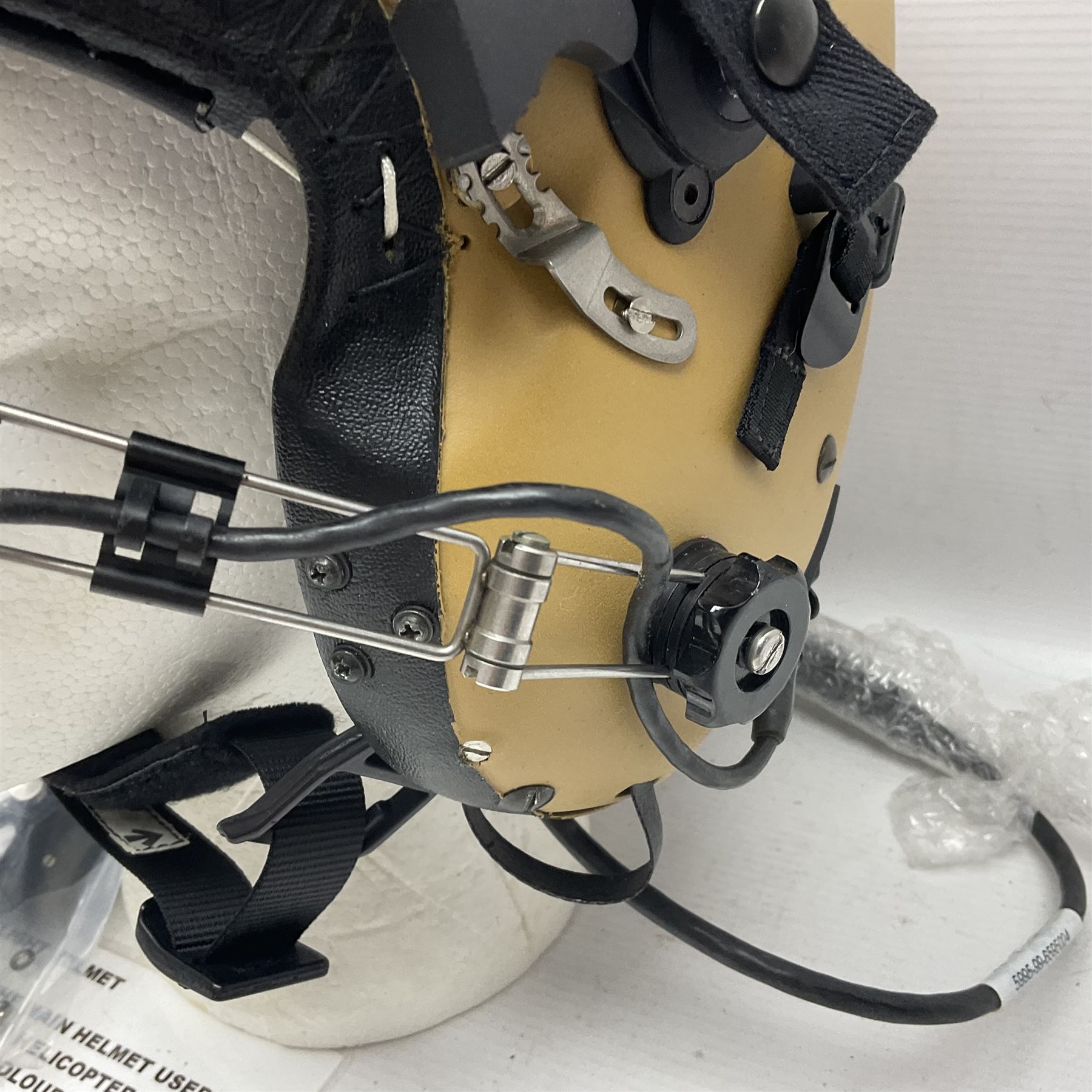 Mk.4 Flight Helmet, as used by RAF and Civilian helicopter pilots; in RAF sand colour (desert use),  fitted with cloth visor cover and working boom mike; has had a complete refit and is bench tested.