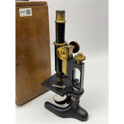 Brass and black enamelled monocular microscope by Bausch & Lomb Rochester New York No.144787 on pitchfork base H32cm; in fitted mahogany box with quantity of unused glass slides