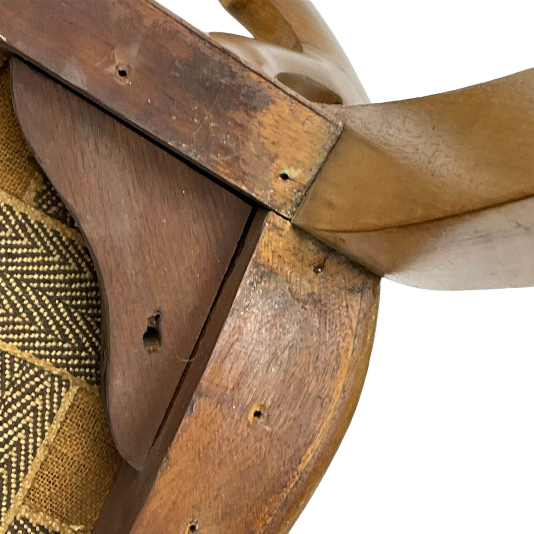 Pair of Victorian walnut side chairs, shaped cresting rail carved with acanthus leaves, overstuffed upholstered seats with stud band, on cabriole supports with scroll carved terminals