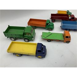 Dinky - seven unboxed and playworn/repainted die-cast commercial vehicles comprising Bedford Articulated lorry, Leyland Comet, Big Bedford, Ford 800 tipper truck, Guy flatbed and planked flatbed lorries and Dodge tipper truck (7)