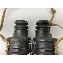 Pair of WWII German U-boat binoculars probably 7 x 50 by Leitz, with rubber eye piece protector covers and leather case stamped with Kriegsmarine mark to the lid and dated 1944, with leather strap.