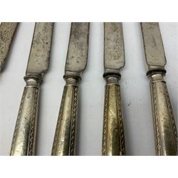 Set of six silver handled butter knives, and a silver handled shoehorn, all hallmarked, but hallmarks worn and indistinct