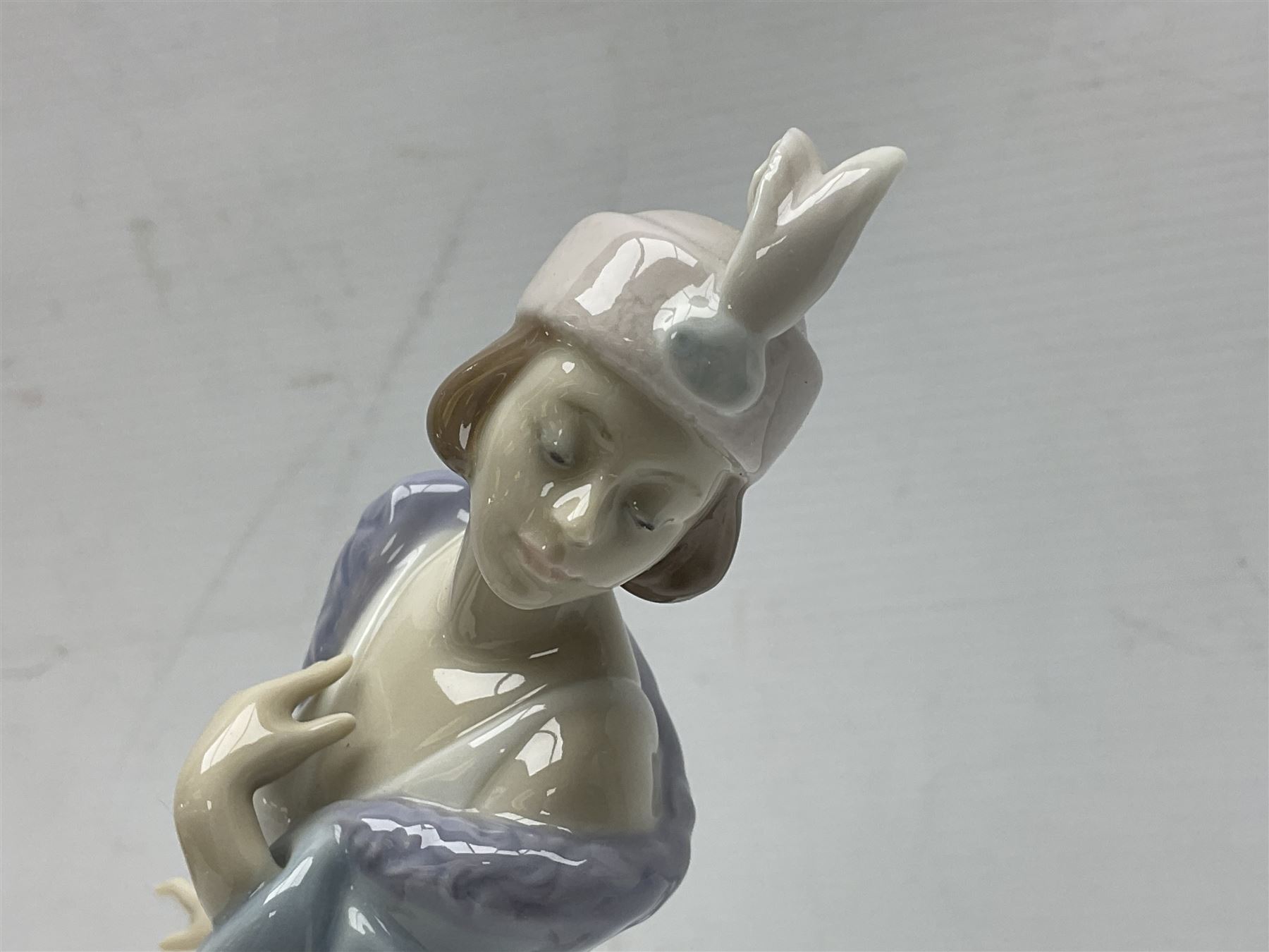 Three Lladro figures of ladies comprising 'The Flirt' model no 5789, 'Ingenue' model no 5487 and 'Carefree' model no 5790, all with boxes