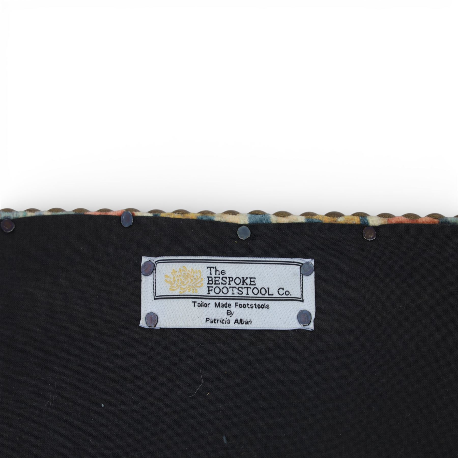 Pair of needlepoint footstools, retailed by The Bespoke Footstool Co, brass studded trim on tapered oak supports