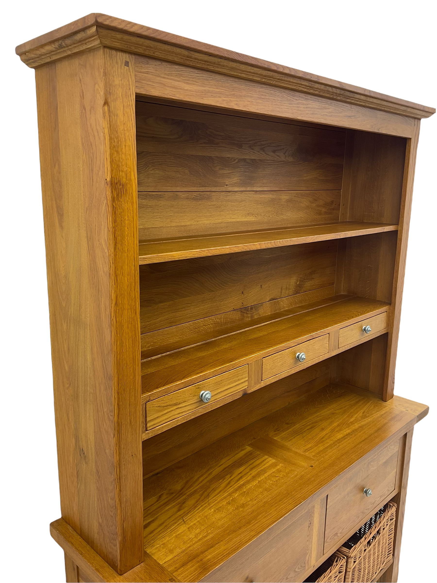 Manor Oak - light oak dresser and rack, fitted with two shelves with three drawers, two deep drawers and pot baked base with basket storage