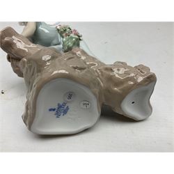 Lladro Privilege figure, Prince of Elves, modelled as an elf with wings leaning upon a rock, with original box, no 7690, sculpted by Joan Coderch, year issue 2001, year retired 2003, H23cm