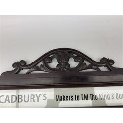 Victorian Cadbury's mahogany sign, the rectangular body surrounding 'Cadbury's Makers to T.M The King & Queen' lettering below carved pediment, W95cm H34cm